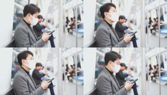年轻人戴着口罩在地铁站使用手机高清在线视频素材下载