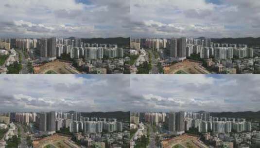 蓝天白云下的城市景观高清在线视频素材下载