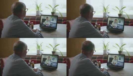 电脑上视频聊天的老年人高清在线视频素材下载