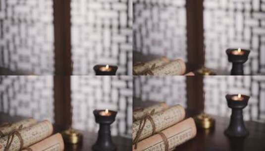古代书房书桌上燃烧的蜡烛和古书诗经高清在线视频素材下载