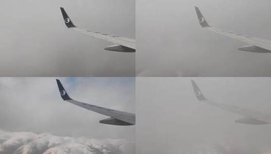 青海祁连山脉山东航空航班云中穿梭高清在线视频素材下载