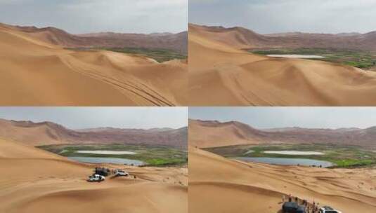 航拍沙漠中的车队和海子高清在线视频素材下载