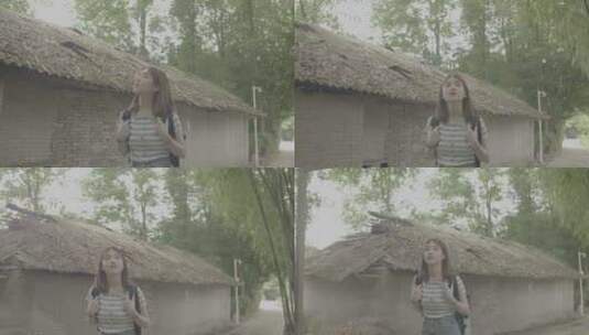 女孩漫步竹林欣赏古老乡村田间风景灰片高清在线视频素材下载