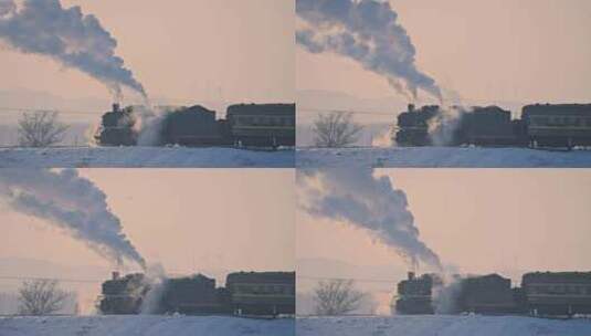 中国东北冬季白雪落日下的蒸汽机车老式火车高清在线视频素材下载