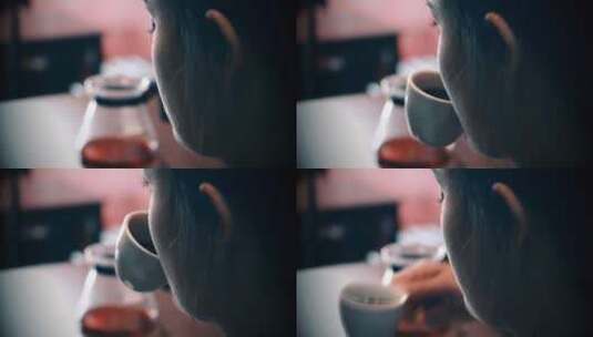 侧面拍摄女子喝咖啡高清在线视频素材下载