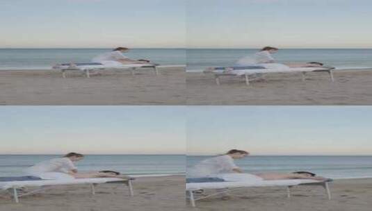 年轻的高加索男性在海滩慢动作镜头中获得专高清在线视频素材下载