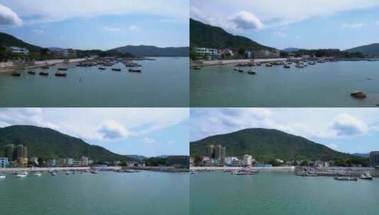 航拍深圳大鹏繁华热闹的东山码头海鲜市场高清在线视频素材下载