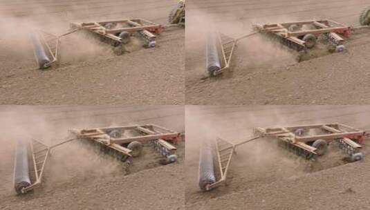 田间沙尘云拖拉机细化耕作土壤高清在线视频素材下载
