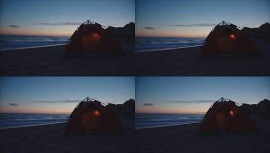 海滩上有灯的帐篷高清在线视频素材下载
