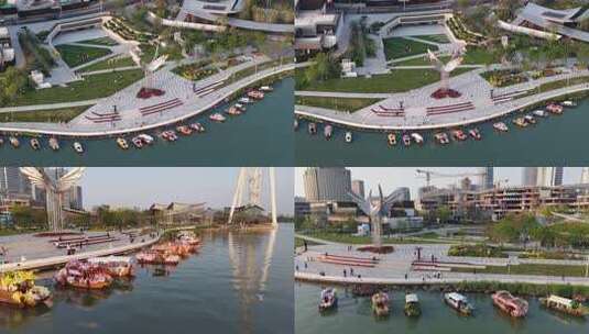 金鸡湖飞翔雕塑，水上花船城市风光  4K高清在线视频素材下载