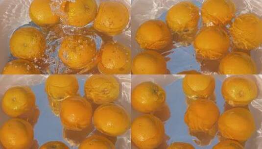 橙子入水溅起水花画面 橘子掉入水中高清在线视频素材下载