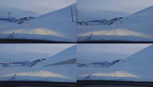 汽车行驶在大雪覆盖的新疆219国道上高清在线视频素材下载
