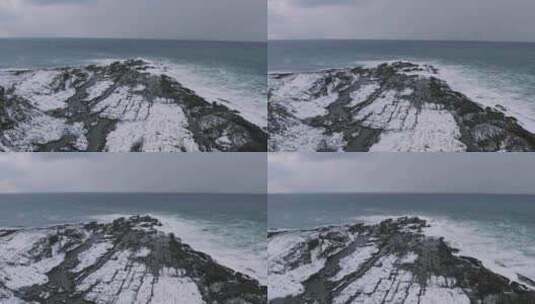 航拍被大雪覆盖的海岸高清在线视频素材下载