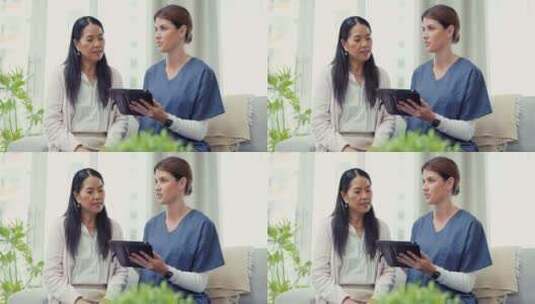 平板电脑、咨询或护士向女性解释医疗报告结高清在线视频素材下载