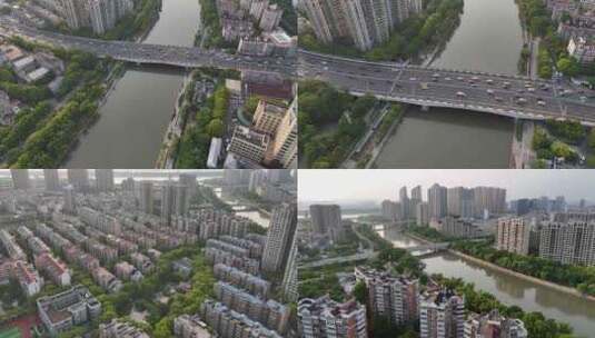 白天航拍城市群楼小河桥梁车流高清在线视频素材下载