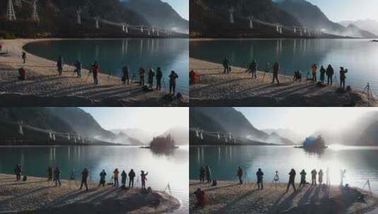 西藏风光视频高原湖泊日出一群摄影爱好者高清在线视频素材下载