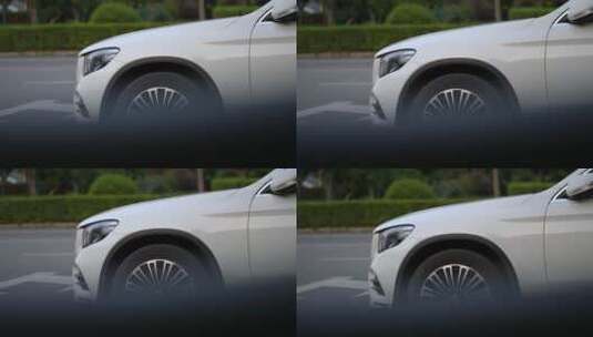 车窗外停放的一台白色奔驰GLC高清在线视频素材下载