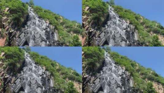 济南市历城黄巢水库，高空流水而下形成瀑布高清在线视频素材下载