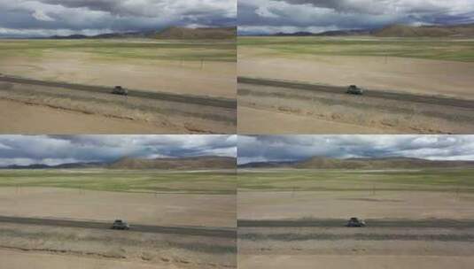 西藏阿里自驾游旅行汽车越野航拍视角高清在线视频素材下载