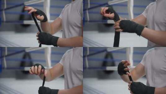 训练前用拳击绷带裹手的特写高清在线视频素材下载