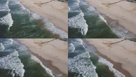 航拍大海拍打沙滩海岸线的唯美风光高清在线视频素材下载