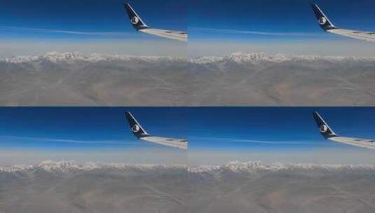 山东航空航班飞过青海祁连山脉雪山群峰高清在线视频素材下载