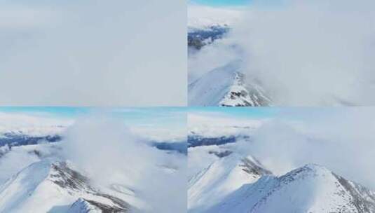 云雾弥漫的夹金山雪山航拍风景高清在线视频素材下载