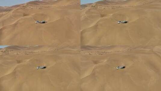 航拍沙漠中的旅行者高清在线视频素材下载