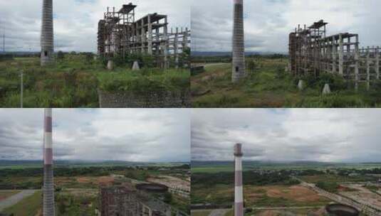 废弃废旧的工厂建设未完工，烟冲和水泥柱子高清在线视频素材下载