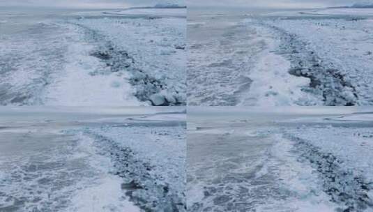 无人机飞越冰岛冰川泻湖附近的钻石海滩海岸线高清在线视频素材下载