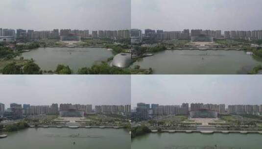 航拍河南漯河市市民之家月湾湖公园高清在线视频素材下载