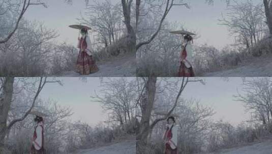 峨眉山雪山中摄影的汉服美女高清在线视频素材下载