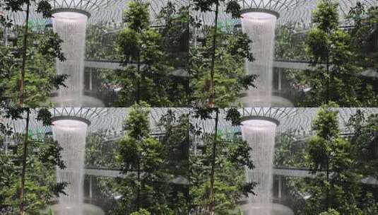 新加坡樟宜机场瀑布与网红小火车高清在线视频素材下载