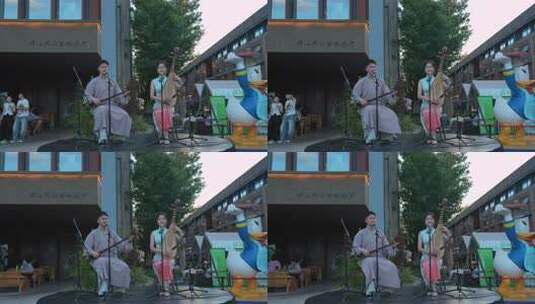 评弹表演 传统民乐与现代卡通的趣味碰撞高清在线视频素材下载