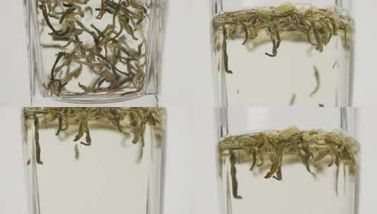 玻璃杯中绿茶冲泡特写高清在线视频素材下载