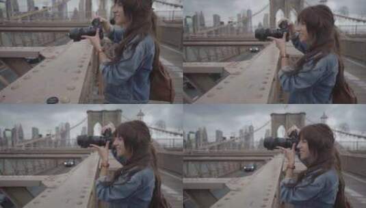 女摄影师在钢桥上拍照高清在线视频素材下载