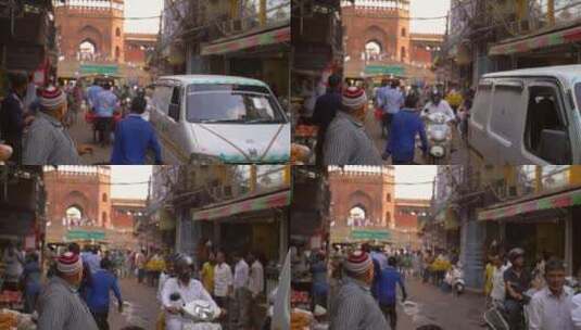 商贩在拥挤的印度街上招揽客人高清在线视频素材下载