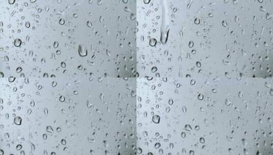 玻璃背景上的雨滴高清在线视频素材下载