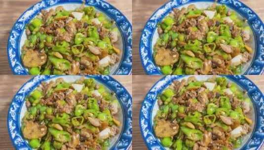 家常菜品青椒抄河蚌4k视频滑轨平移高清在线视频素材下载