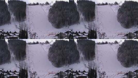 滑雪者在雪地中欣赏这座山高清在线视频素材下载
