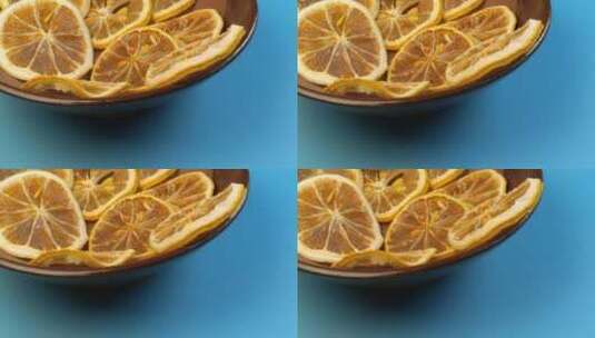 蓝底柠檬片柠檬干干柠檬水果高清在线视频素材下载