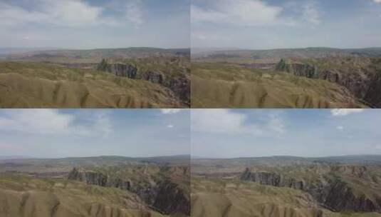 航拍新疆伊犁山丘公路大气风光高清在线视频素材下载