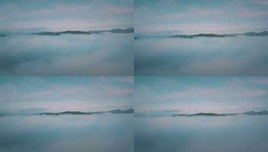 航拍平流雾覆盖的森林山脉高清在线视频素材下载