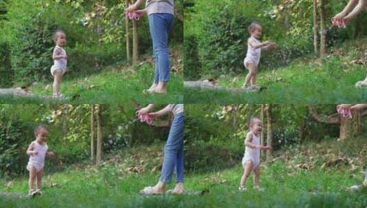小女孩和妈妈一起在公园玩耍吹泡泡快乐童年高清在线视频素材下载
