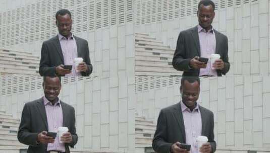 非洲黑人在成都街头看手机微笑高清在线视频素材下载