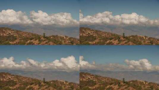 蓝天白云延时下的山脉自然风光高清在线视频素材下载