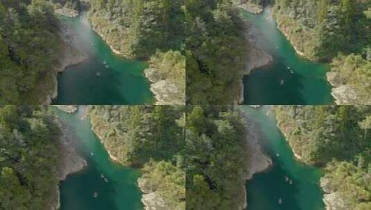斯隆莫-独木舟旅游中的人们划桨美丽的原始清澈的蓝色佩鲁斯河，新西兰-艾瑞高清在线视频素材下载