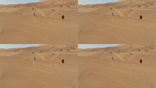 航拍沙漠中的人高清在线视频素材下载