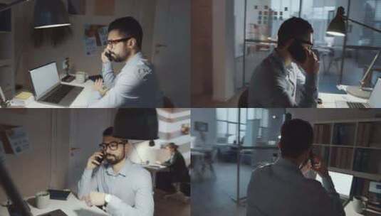 中东男性上班族在办公桌前打手机高清在线视频素材下载