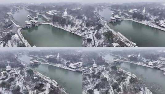 航拍瘦西湖景区园林大明寺观音山宋夹城雪景高清在线视频素材下载